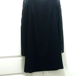 Beautiful dress with see through sleeves that flare out